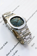 Patek Philippe Nautilus Pristine condition. Extract of the archives