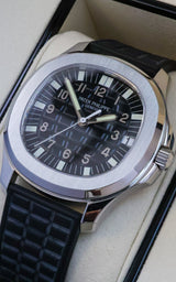 Patek Philippe Aquanaut Like New Old Stock. Including accessories