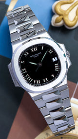 Patek Philippe Nautilus Pristine condition. Box and papers 3800/1a