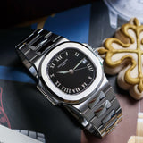Patek Philippe Nautilus Pristine condition. Box and papers 3800/1a