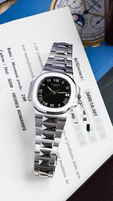 Patek Philippe Nautilus Pristine condition. Box and papers 3800/1a